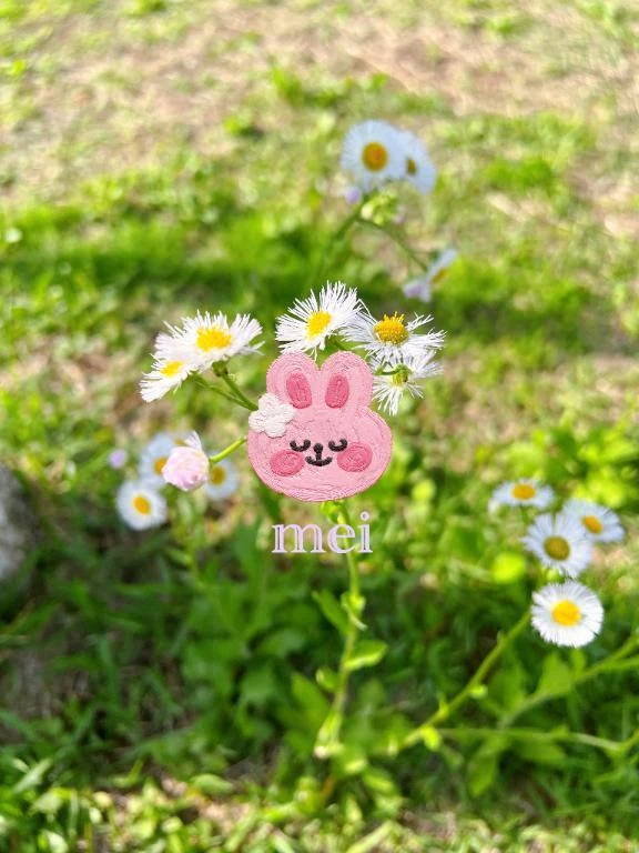 めい